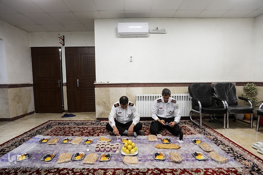 Firefighters in Tehran preparing to break their fast