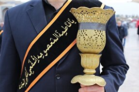 میزبانی خادمان حرم حضرت معصومه(س) از زائران در ماه رمضان + عکس