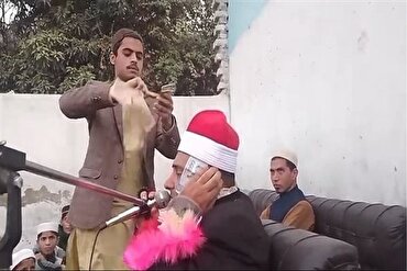 Египетский чтец отреагировал на бросание денег на пакистанском собрании Корана